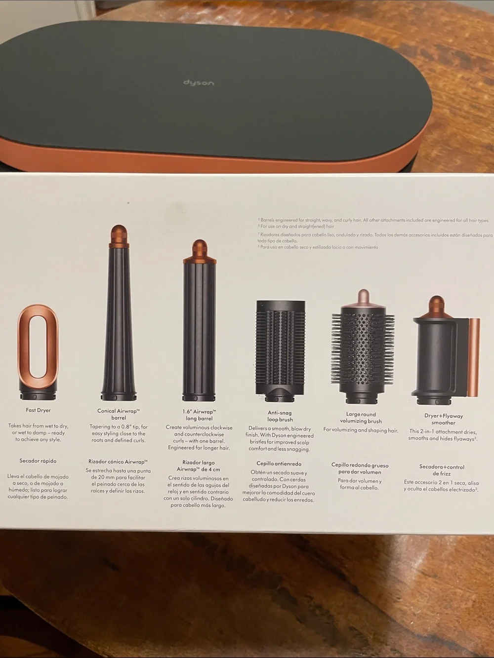 Dyson Airwrap i.d. Straight+wavy. Color copper and black.